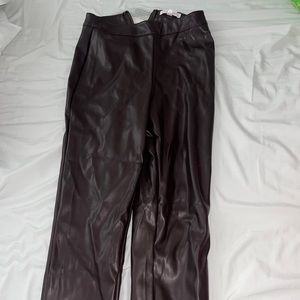 Brown leather pants size small. Never worn